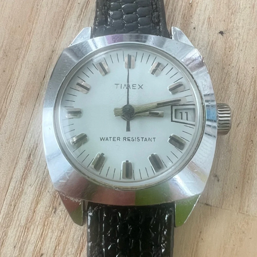Vintage Timex ladies silver tone black leather mechanical Winding dress watch